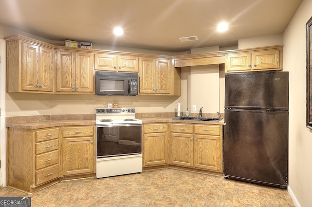 1850 Noblin Ridge Way, Duluth, GA 30097 - kitchen with black appliances, light countertops, and light brown cabinetry