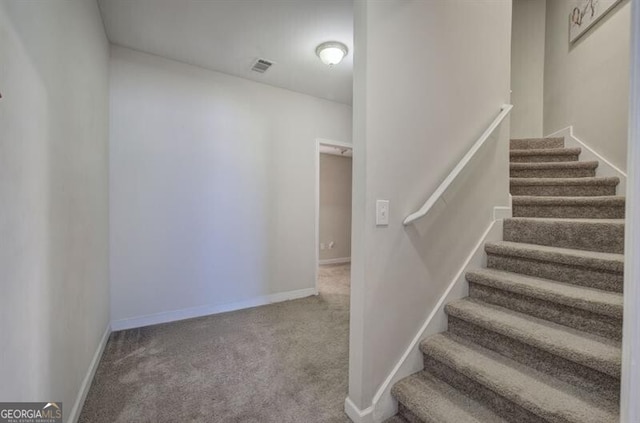 5327 Saville Dr NW, Acworth, GA 30101 - stairway featuring carpet floors and baseboards