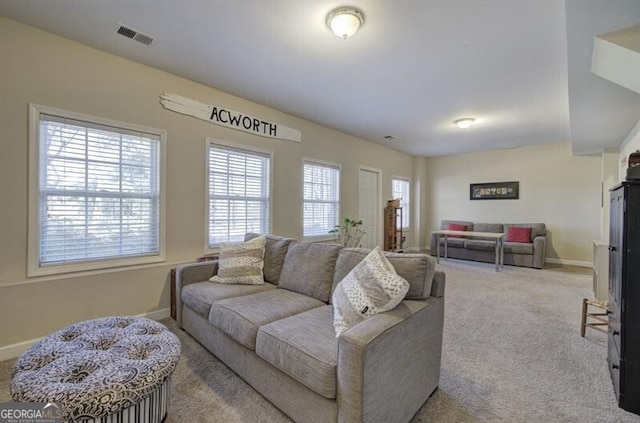5327 Saville Dr NW, Acworth, GA 30101 - carpeted living room with baseboards