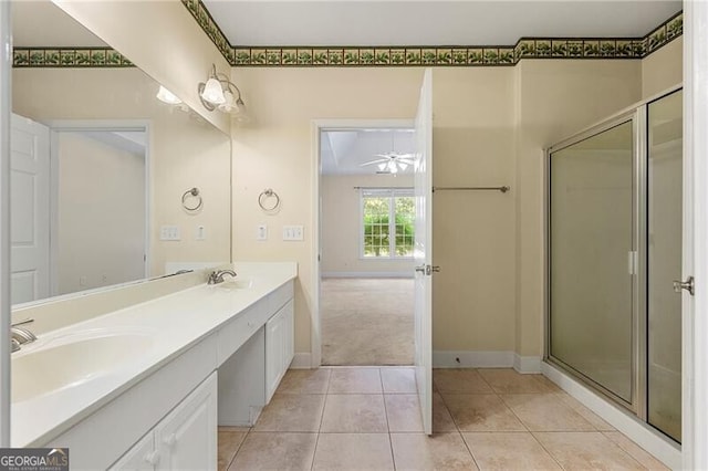 2001 Macland Square Dr Unit 11, Marietta, GA 30064 - bathroom with double vanity, a shower stall, ceiling fan, baseboards, and tile patterned floors