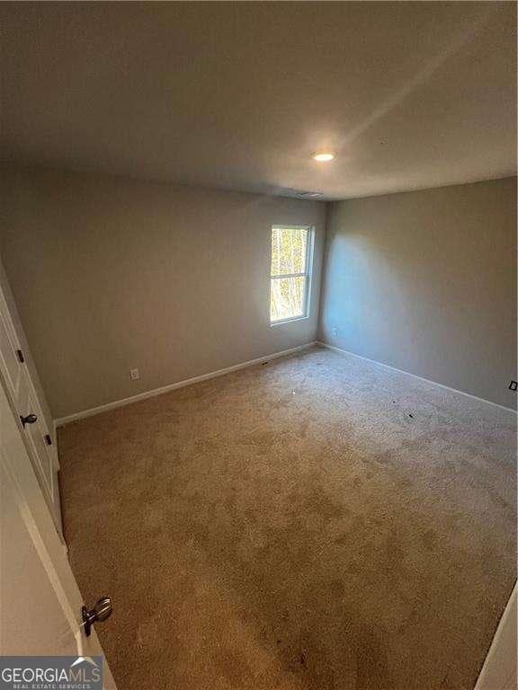 192 Paces Lakes Pt, Dallas, GA 30157 - carpeted spare room with baseboards and recessed lighting