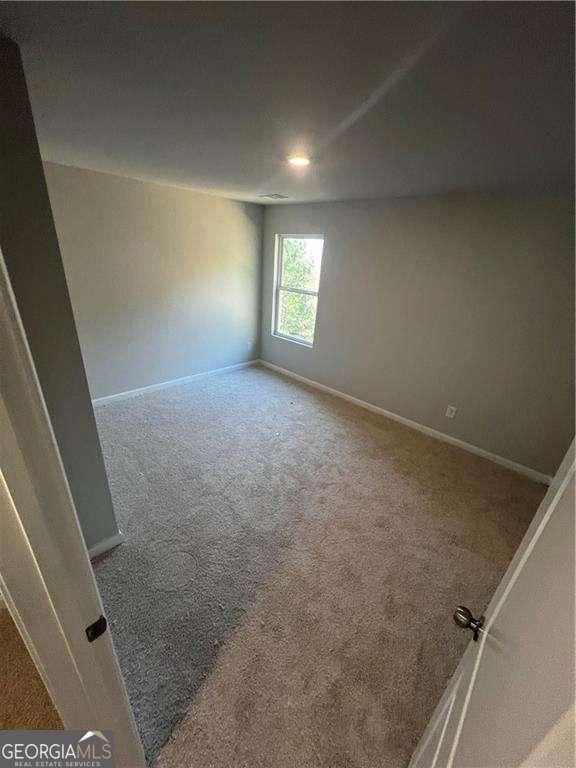 192 Paces Lakes Pt, Dallas, GA 30157 - carpeted empty room with baseboards