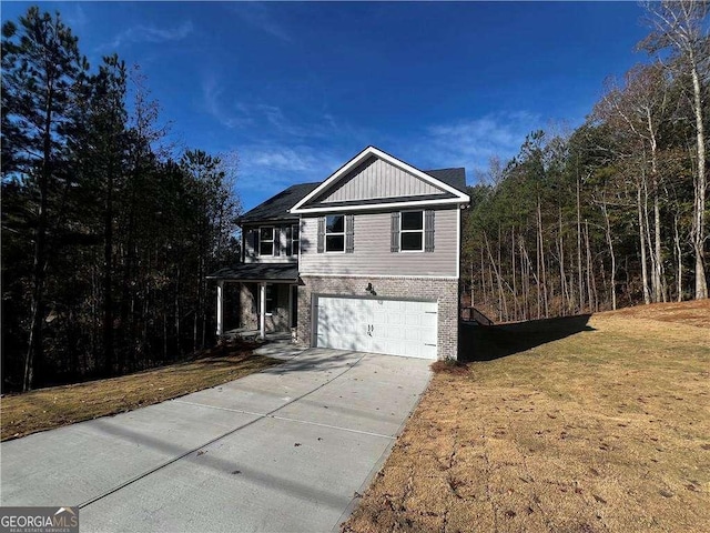 192 Paces Lakes Pt, Dallas, GA 30157 - view of front of house featuring a garage, brick siding, driveway, and a front lawn