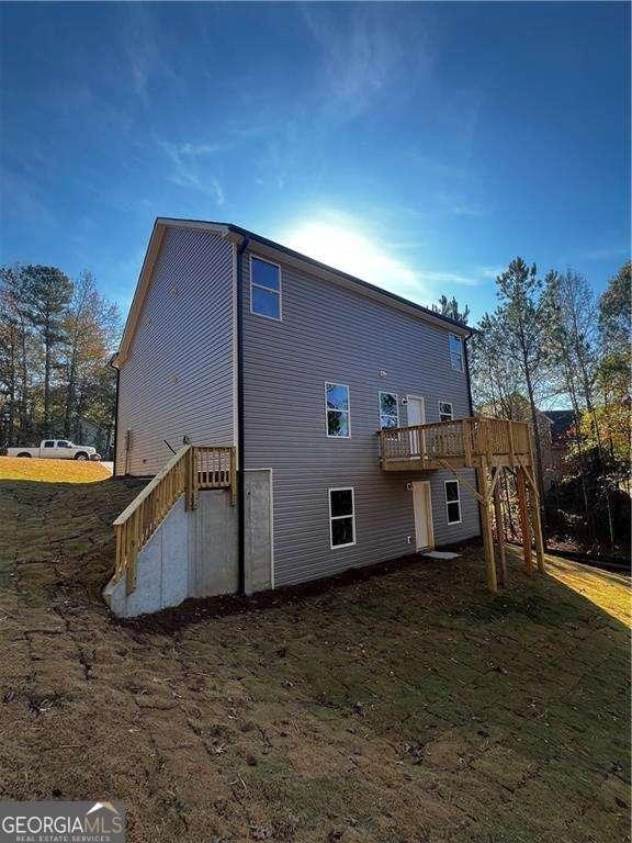 192 Paces Lakes Pt, Dallas, GA 30157 - back of house featuring stairs and a deck