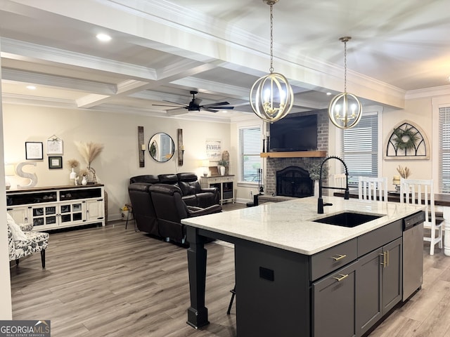 2991 Rice Creek Ct Unit 84P, Jefferson, GA 30549 - kitchen featuring a sink, stainless steel dishwasher, crown molding, light stone counters, and beam ceiling