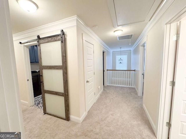 2991 Rice Creek Ct Unit 84P, Jefferson, GA 30549 - hall featuring attic access, carpet flooring, baseboards, and ornamental molding