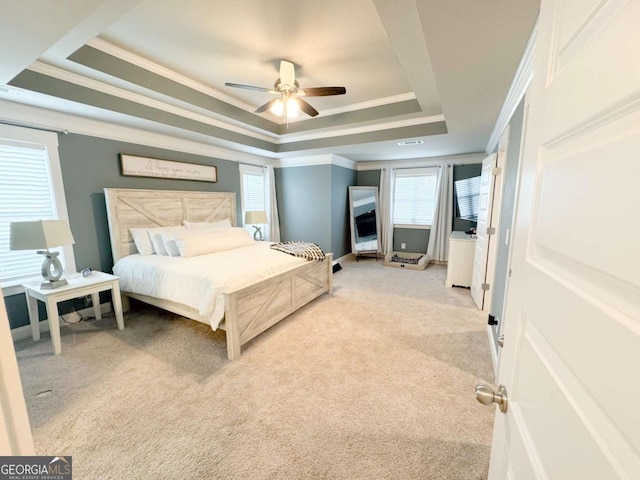 2991 Rice Creek Ct Unit 84P, Jefferson, GA 30549 - carpeted bedroom with a raised ceiling, ornamental molding, multiple windows, and a ceiling fan