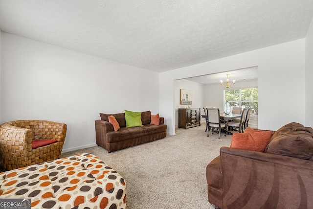 5125 Winding Glen Dr, Lithonia, GA 30038 - carpeted living area featuring a chandelier and a textured ceiling