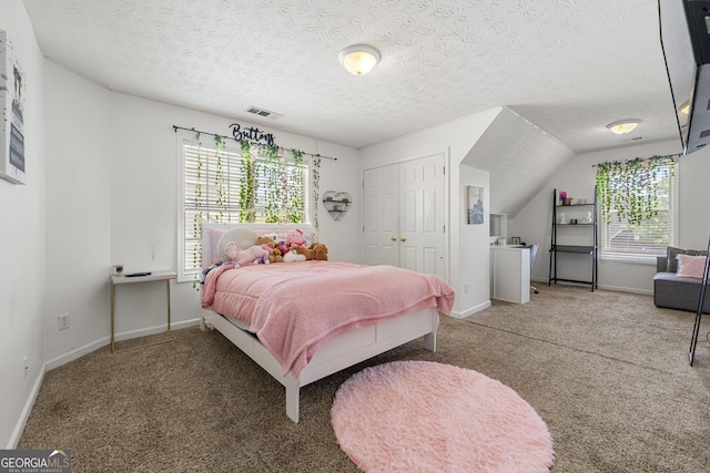 5125 Winding Glen Dr, Lithonia, GA 30038 - bedroom with carpet, baseboards, a closet, and a textured ceiling