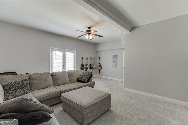 440 S Alexander St, Buford, GA 30518 - living area with ceiling fan, light colored carpet, beam ceiling, and baseboards