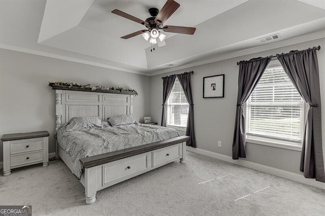 440 S Alexander St, Buford, GA 30518 - bedroom featuring a tray ceiling, light colored carpet, baseboards, and a ceiling fan