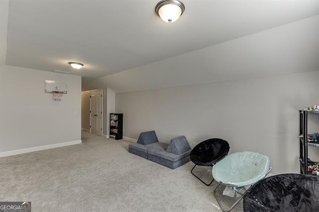 440 S Alexander St, Buford, GA 30518 - living area featuring vaulted ceiling, carpet flooring, and baseboards