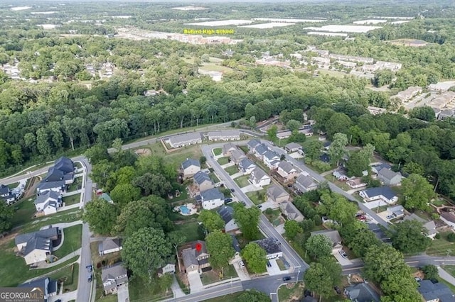 440 S Alexander St, Buford, GA 30518 - aerial overview of property's location featuring nearby suburban area and a heavily wooded area