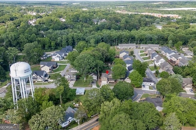 440 S Alexander St, Buford, GA 30518 - aerial view of property and surrounding area featuring nearby suburban area and a forest
