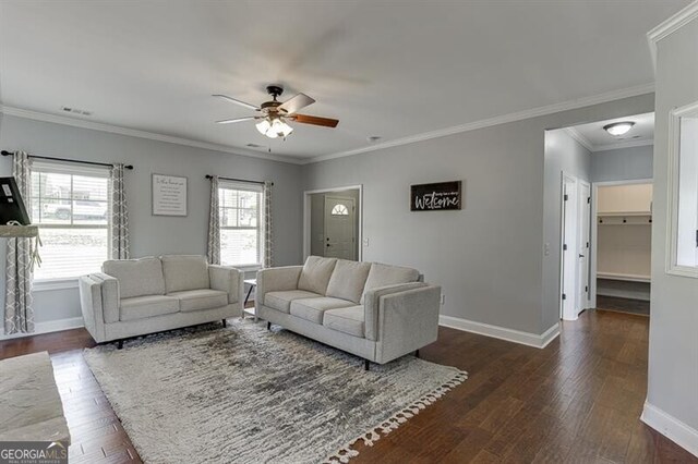 440 S Alexander St, Buford, GA 30518 - living room featuring a ceiling fan, baseboards, dark wood-type flooring, and ornamental molding