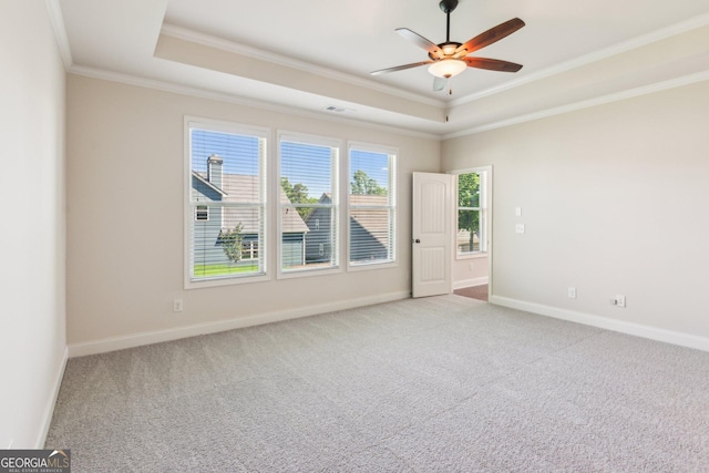 4416 Links Blvd, Jefferson, GA 30549 - carpeted spare room with a tray ceiling, ornamental molding, ceiling fan, and baseboards