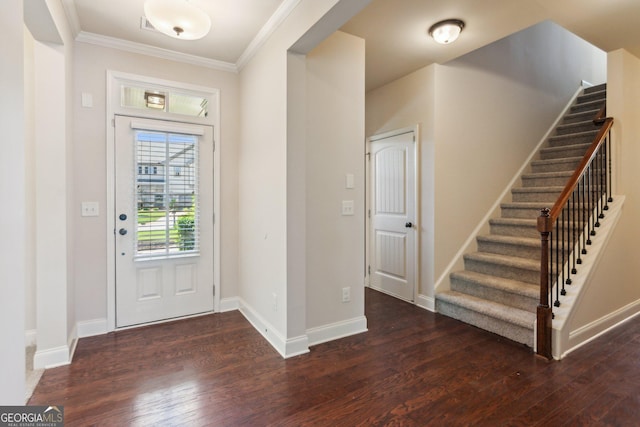 4416 Links Blvd, Jefferson, GA 30549 - entrance foyer featuring wood finished floors, crown molding, stairway, and baseboards