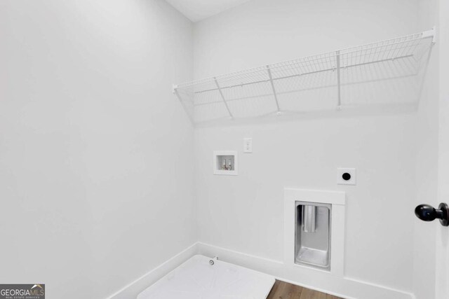 6775 Cambridge Dr, Flowery Branch, GA 30542 - laundry area featuring washer hookup, hookup for an electric dryer, and gas dryer hookup