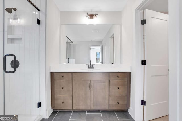 6775 Cambridge Dr, Flowery Branch, GA 30542 - bathroom featuring a shower stall and vanity