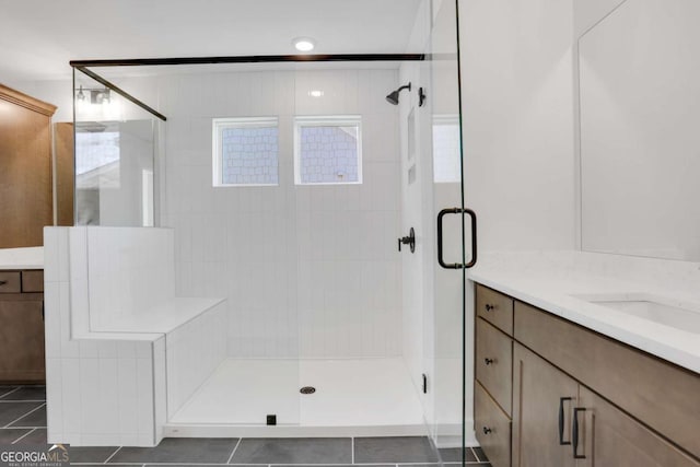 6775 Cambridge Dr, Flowery Branch, GA 30542 - full bathroom featuring a shower stall, tile patterned flooring, and vanity