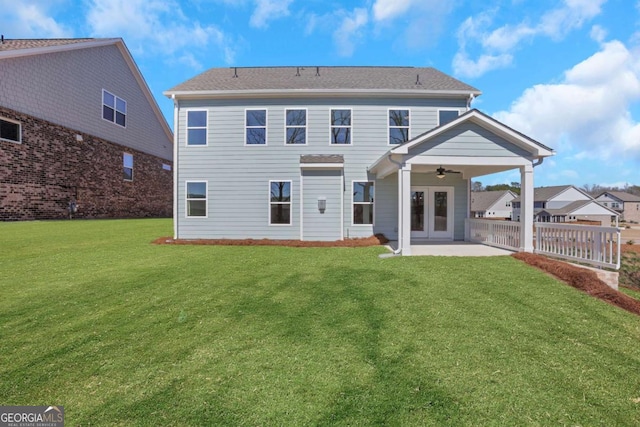 6775 Cambridge Dr, Flowery Branch, GA 30542 - back of property featuring ceiling fan, a patio, a lawn, and french doors