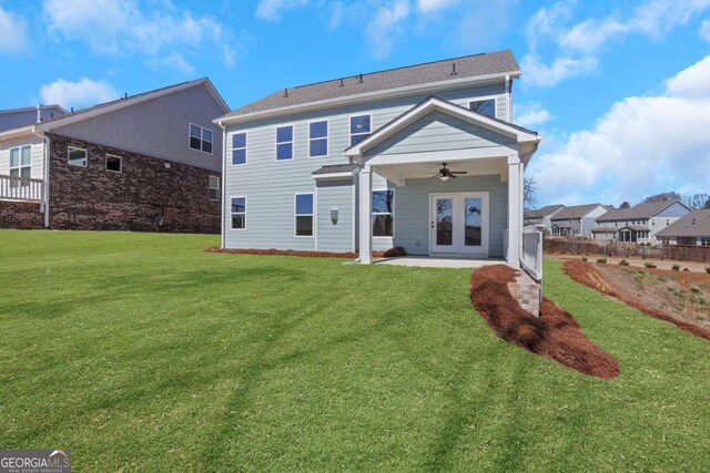 6775 Cambridge Dr, Flowery Branch, GA 30542 - back of house with ceiling fan, a lawn, and french doors