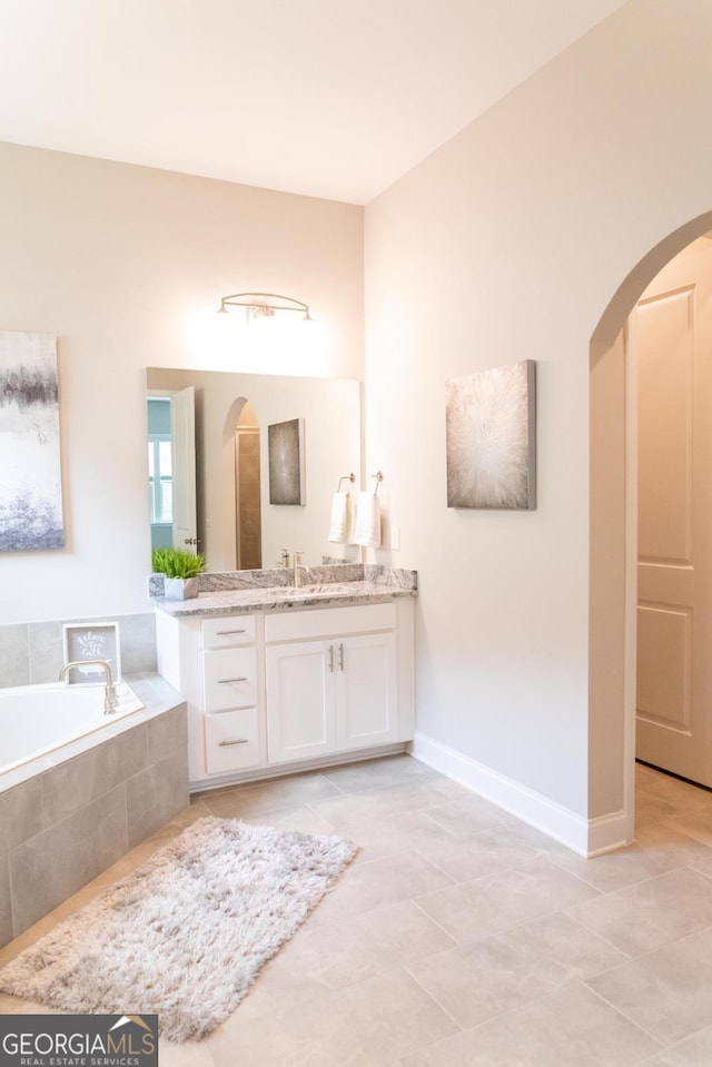 2665 Crowbrook Way, Cumming, GA 30040 - full bath with vanity, a garden tub, and tile patterned floors
