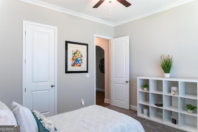 2665 Crowbrook Way, Cumming, GA 30040 - bedroom with ornamental molding, carpet floors, arched walkways, and a ceiling fan