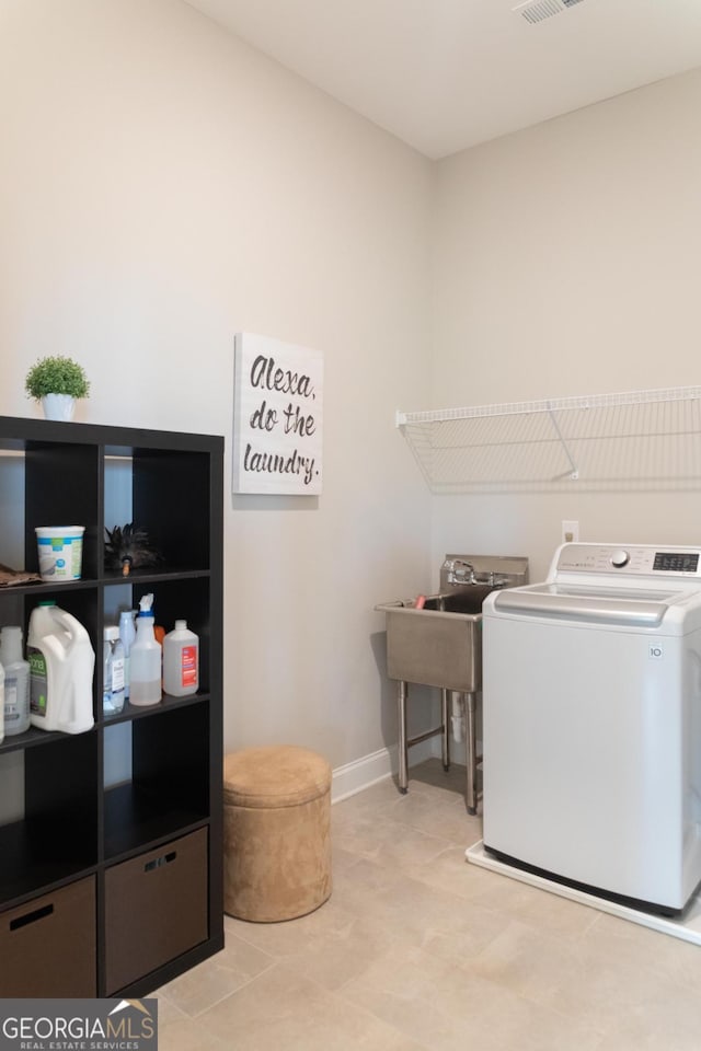 2665 Crowbrook Way, Cumming, GA 30040 - washroom with washer / clothes dryer and baseboards