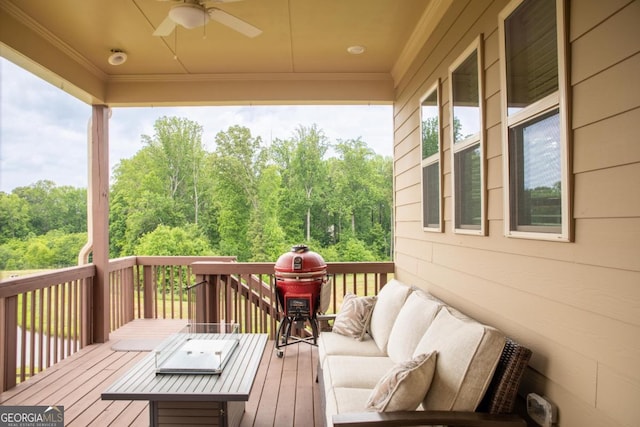 2665 Crowbrook Way, Cumming, GA 30040 - deck with an outdoor hangout area, a ceiling fan, and a forest view