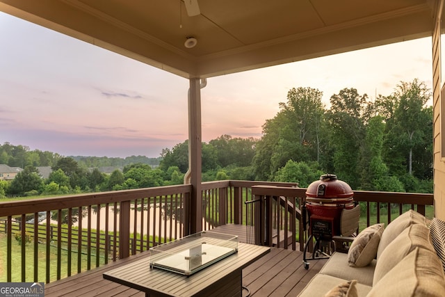 2665 Crowbrook Way, Cumming, GA 30040 - deck at dusk with ceiling fan, an outdoor hangout area, and outdoor dining space