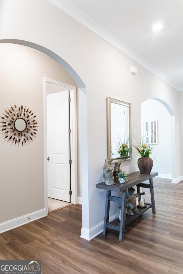 2665 Crowbrook Way, Cumming, GA 30040 - hallway featuring arched walkways, crown molding, and wood finished floors
