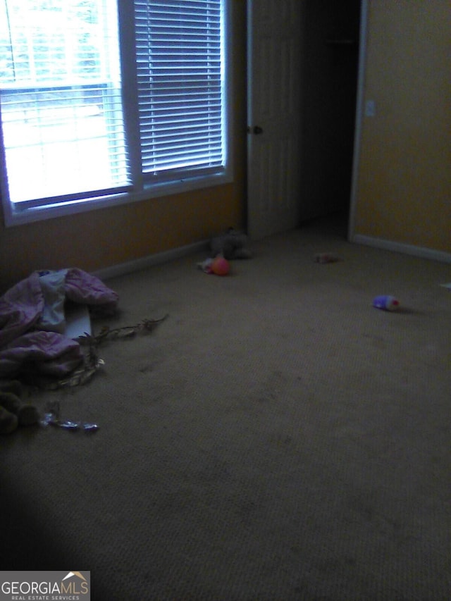 624 Newtown Creek Loop NE, Calhoun, GA 30701 - unfurnished bedroom featuring baseboards and carpet