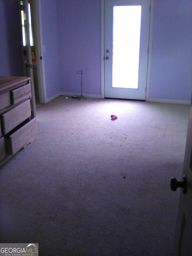 624 Newtown Creek Loop NE, Calhoun, GA 30701 - empty room with healthy amount of natural light, carpet floors, and baseboards