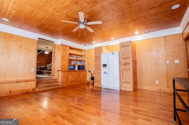 258 Big Oak Rd, Whitesburg, GA 30185 - empty room with a ceiling fan, wooden walls, wood finished floors, wood ceiling, and ornamental molding