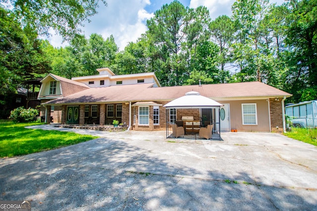 258 Big Oak Rd, Whitesburg, GA 30185 - rear view of house featuring brick siding