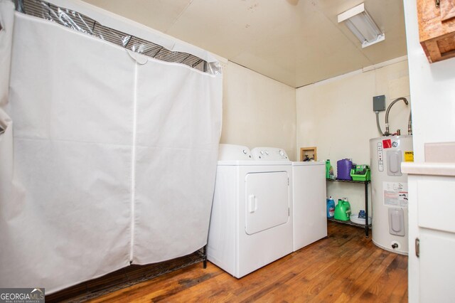 258 Big Oak Rd, Whitesburg, GA 30185 - laundry area with water heater, washing machine and clothes dryer, and wood finished floors