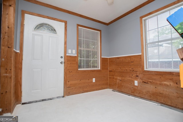258 Big Oak Rd, Whitesburg, GA 30185 - foyer featuring wood walls, ornamental molding, and a wainscoted wall