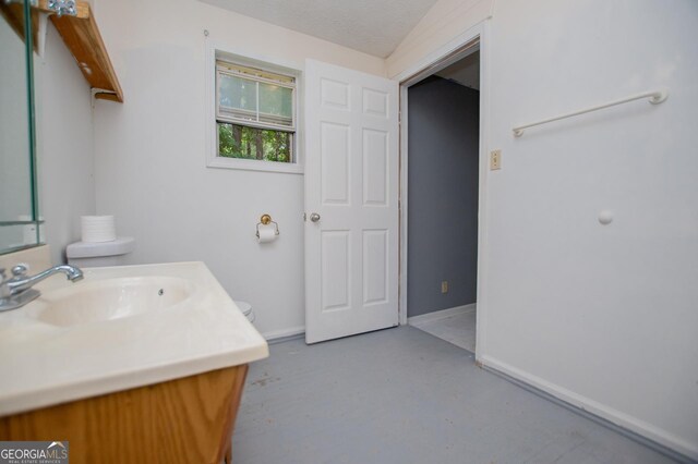 258 Big Oak Rd, Whitesburg, GA 30185 - bathroom featuring vanity, finished concrete flooring, baseboards, and toilet