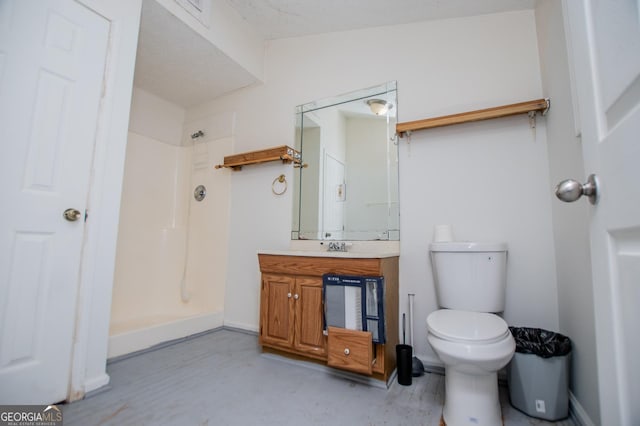 258 Big Oak Rd, Whitesburg, GA 30185 - full bath featuring a shower, toilet, vanity, baseboards, and wood finished floors