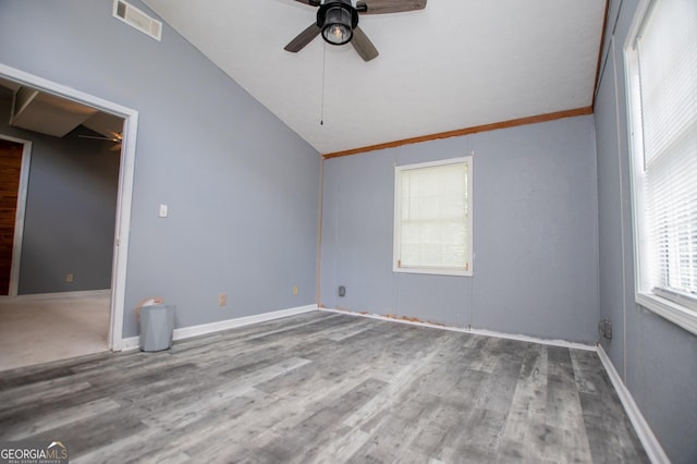 258 Big Oak Rd, Whitesburg, GA 30185 - unfurnished bedroom with vaulted ceiling, wood finished floors, baseboards, and ceiling fan