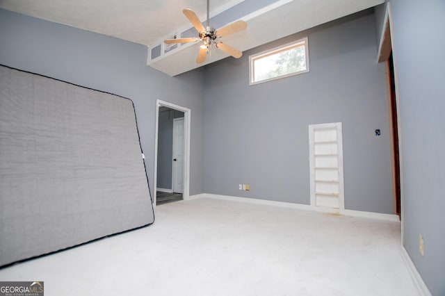 258 Big Oak Rd, Whitesburg, GA 30185 - unfurnished bedroom featuring carpet floors, baseboards, a ceiling fan, and lofted ceiling