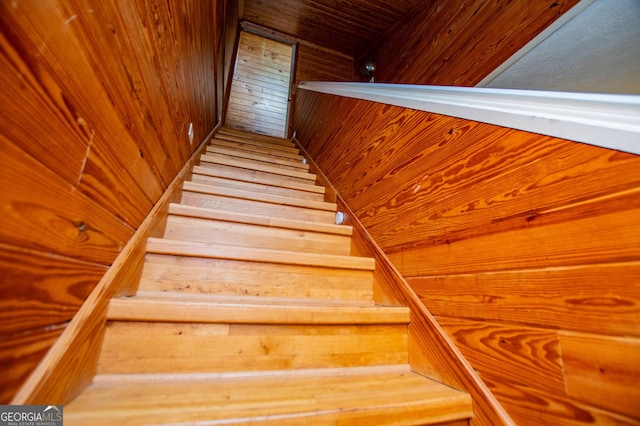 258 Big Oak Rd, Whitesburg, GA 30185 - staircase featuring wood walls and wooden ceiling