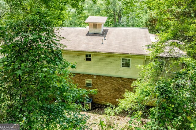 258 Big Oak Rd, Whitesburg, GA 30185 - back of house featuring brick siding