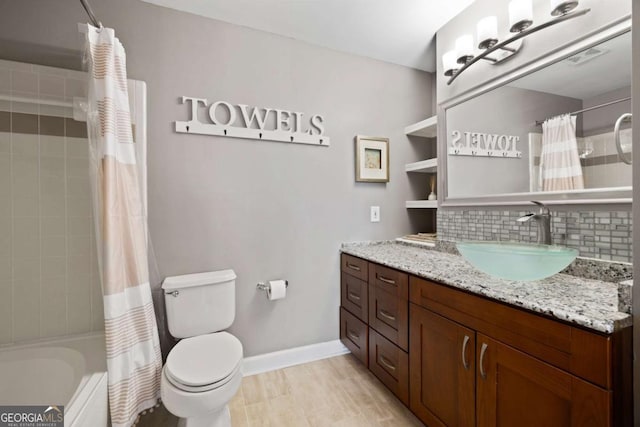 1101 Juniper St NE Unit 1216, Atlanta, GA 30309 - full bathroom featuring decorative backsplash, vanity, and shower / bath combination with curtain
