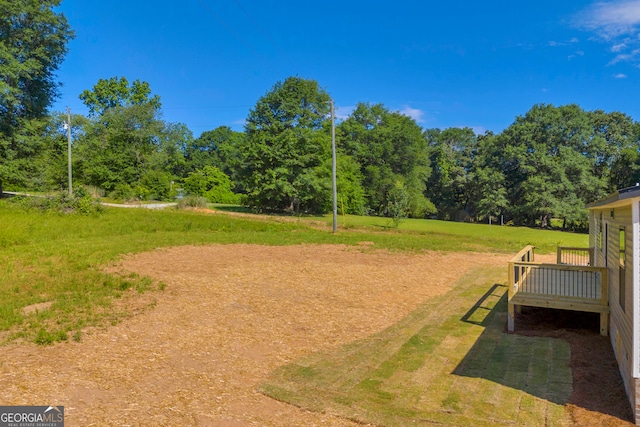 33 Marigold Dr, Carnesville, GA 30521 - view of grassy yard with a deck