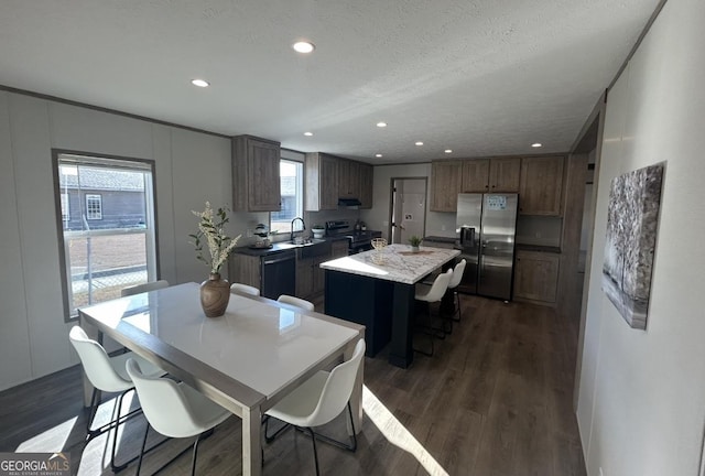 33 Marigold Dr, Carnesville, GA 30521 - kitchen featuring stainless steel appliances, a sink, a center island, recessed lighting, and dark wood-style floors