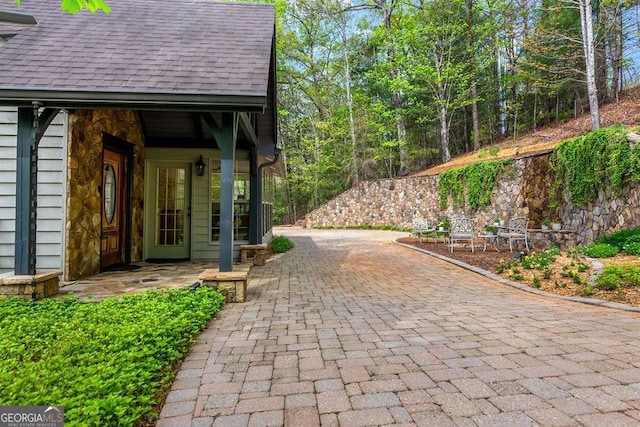 1573 Sautee Trl, Sautee Nacoochee, GA 30571 - property entrance with roof with shingles