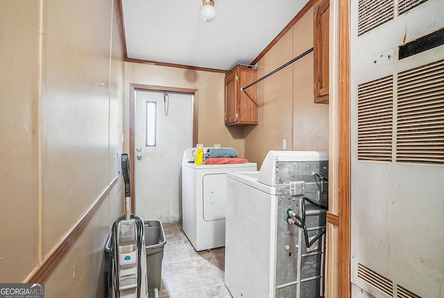 23 Wood Bine Ln, Crawford, GA 30630 - laundry area with a heating unit, separate washer and dryer, cabinet space, a textured ceiling, and crown molding