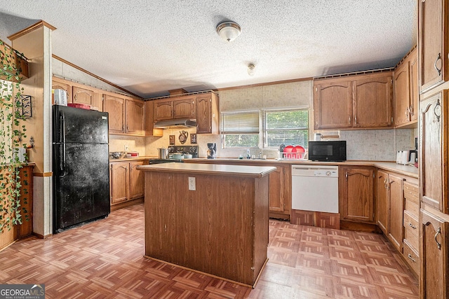 23 Wood Bine Ln, Crawford, GA 30630 - kitchen featuring black appliances, under cabinet range hood, ornamental molding, a kitchen island, and a textured ceiling